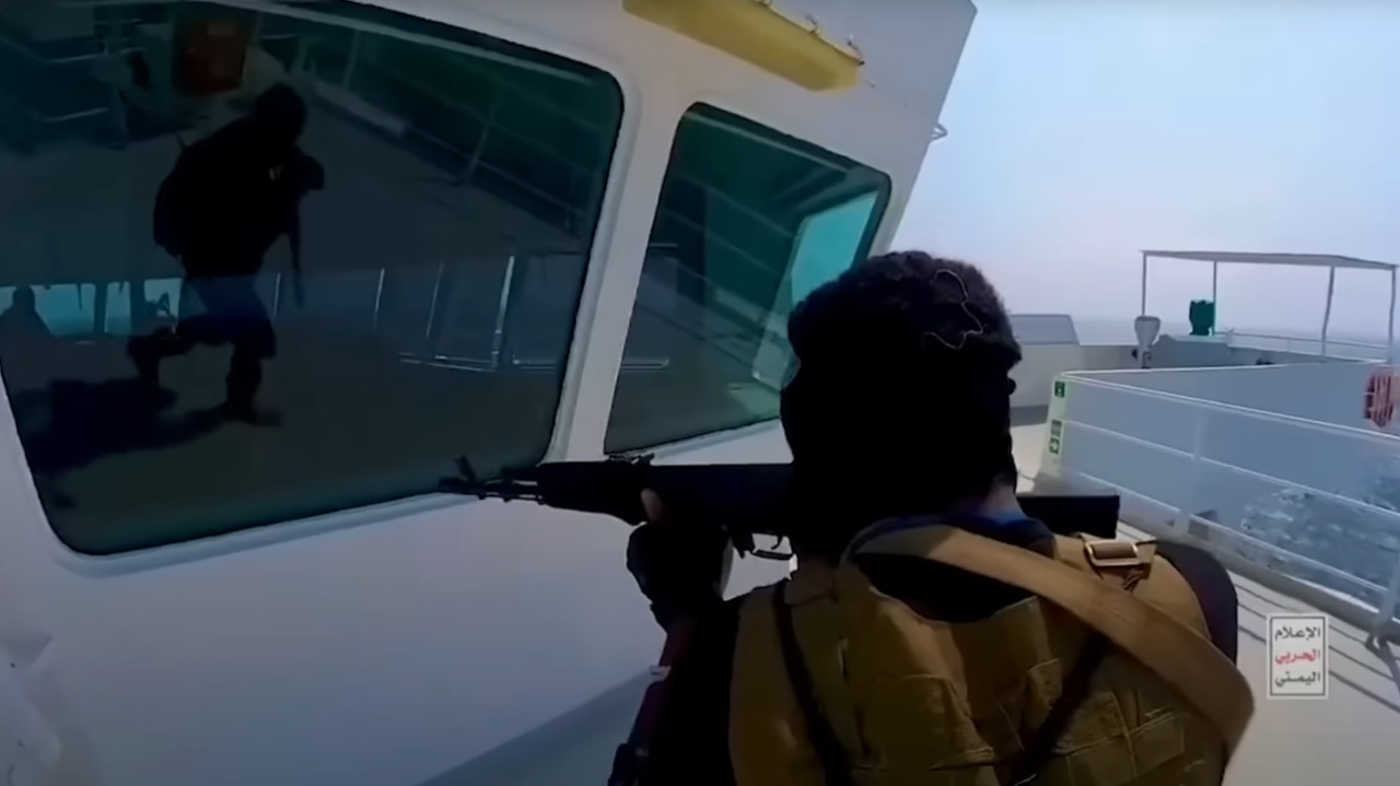 Soldier pointing gun