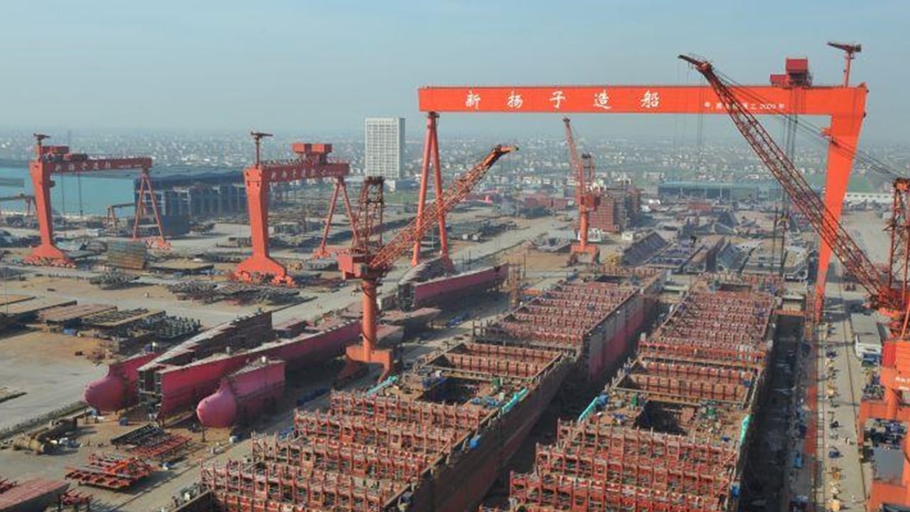 Container ships being built in a shipyard