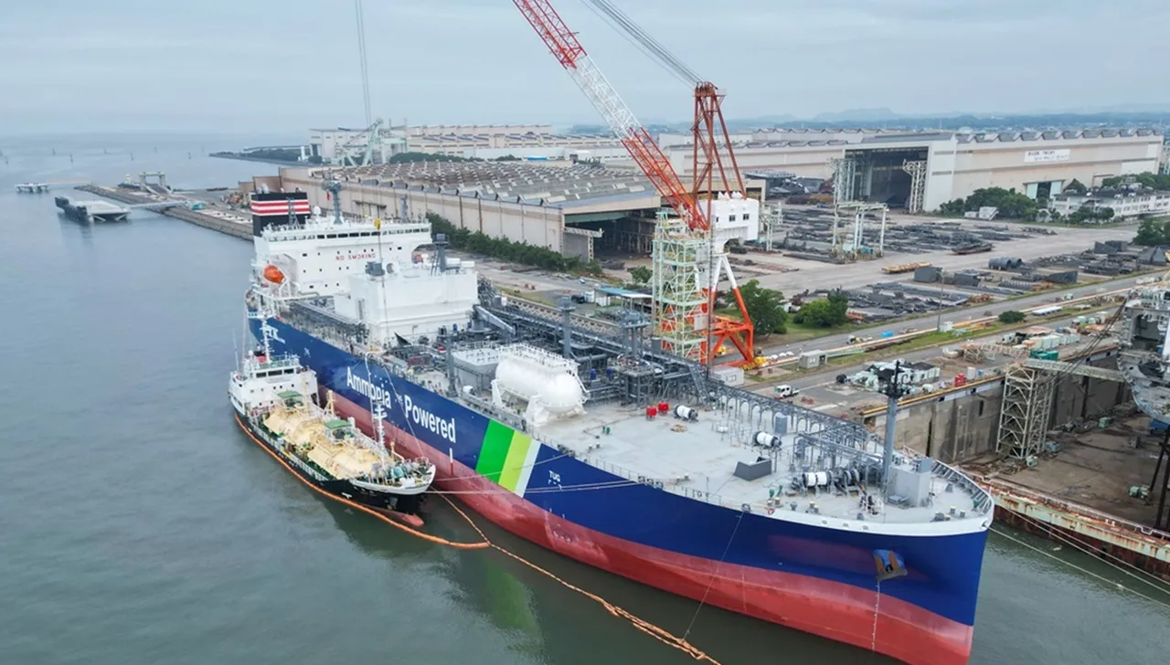 ship refueling from a smaller ship in a shipyard