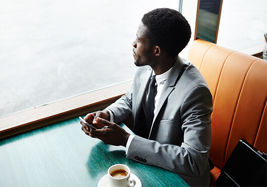 Striving to be accurate Man sitting at a table