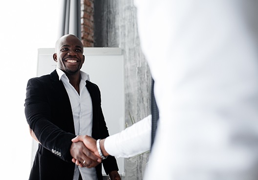 Two business men shaking hands Two business men shaking hands