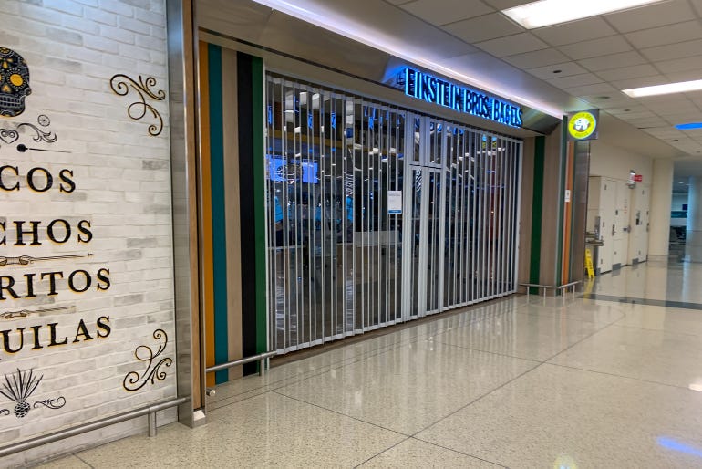 Security fence blocks entrance of a restaurant at an airport