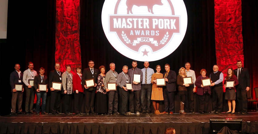 producers and partners on stage at 2019 Iowa Pork Congress 