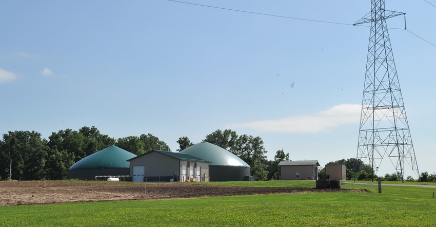 Buildings housing generators and an anaerobic digester 