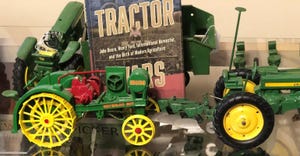 Toy tractor and book