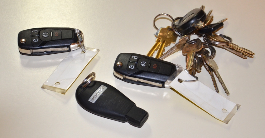 sets of car keys lying on a table
