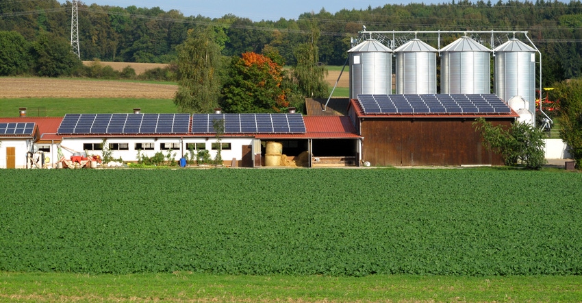farm with solar panels on barn