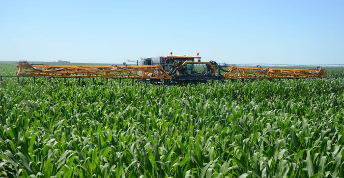 Tim Schmeeckle pilots his Hagie STS12 high-clearance machine through a cornfield on his farm near Gothenburg in summer 2019 Tim Schmeeckle pilots his Hagie STS12 high-clearance machine through a cornfield on his farm near Gothenburg in summer 2019