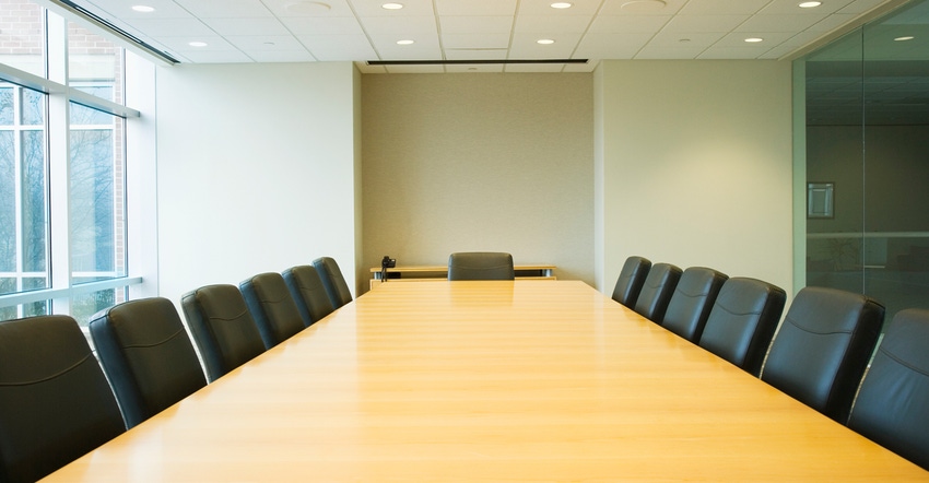 Table in boardroom Table in boardroom