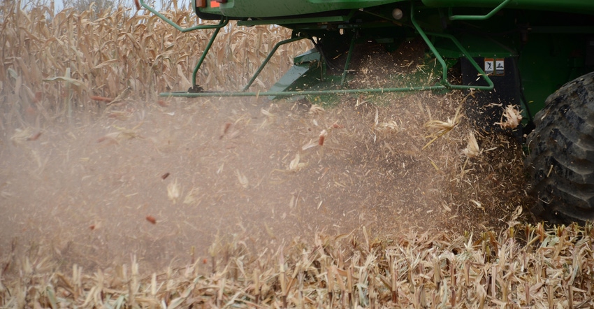 combine chopping and spreading corn residue 