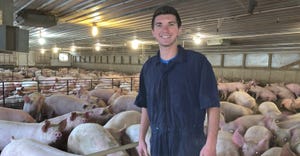 Zebediah Davis of White County, Indiana, in hog barn