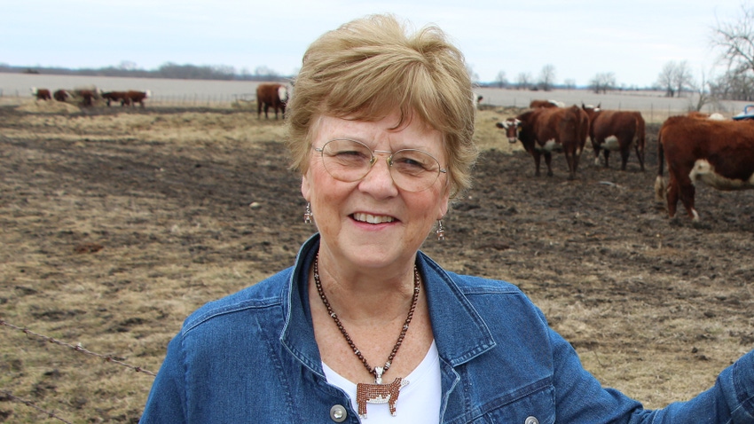Patricia Wood standing in a cattle lot Patricia Wood standing in a cattle lot