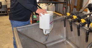 herbicide jug being rinsed out