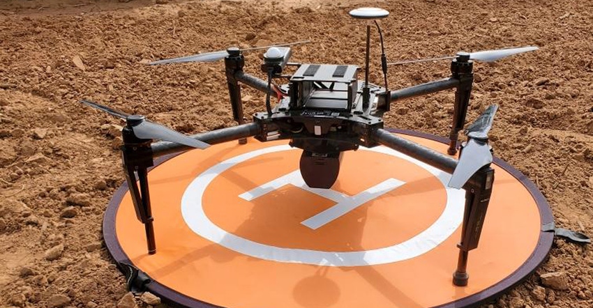 Resized-Drone-pic-on-platform-in-field-web.jpg