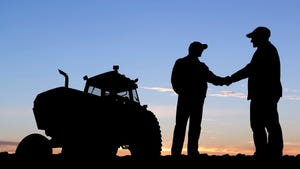 Shaking hands by tractor