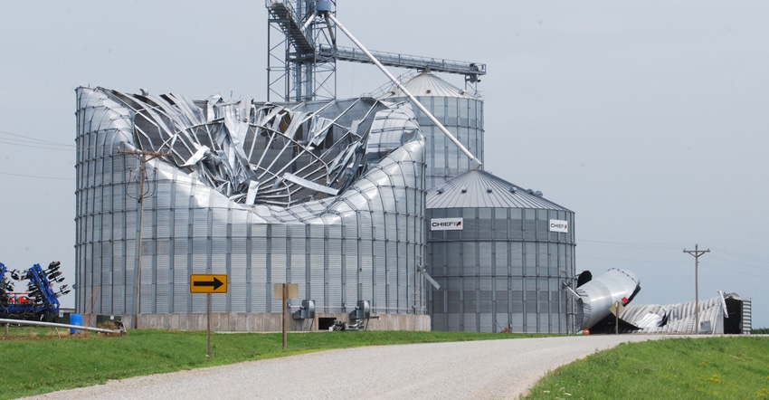 Iowa grain bins blown over and other storage and handling facilities wrecked by recent windstorm. 