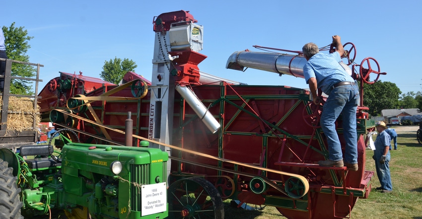 threshing machine with tractor and wagon