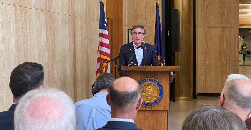 Man speaking at podium