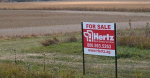 Farmland and for sale sign