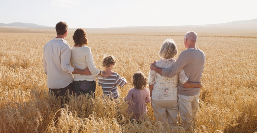 Family in wheat field