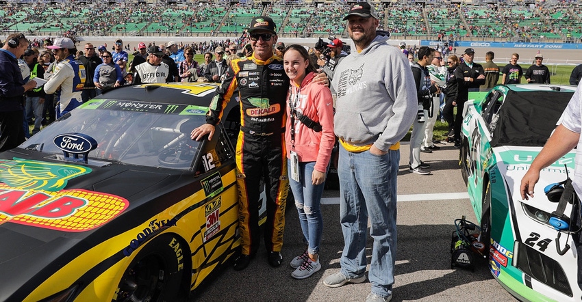 NASCAR driver Clint Bowyer meets with North Lyon County FFA student Kaylee Burton and advisor Jacob Lang