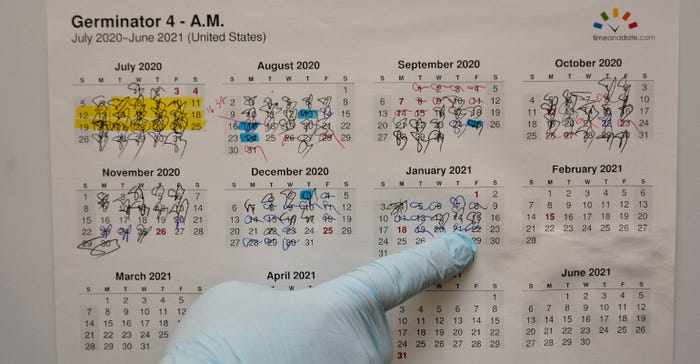 calendar on door of germinator at MCIA lab