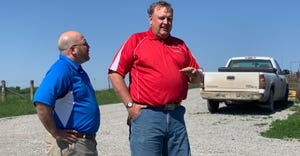 Travis Dunekacke, owner of TD Niche Pork in Elk Creek, talks with Nate Blum of the Nebraska Grain Sorghum Board.