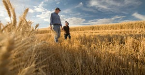 father and son in field