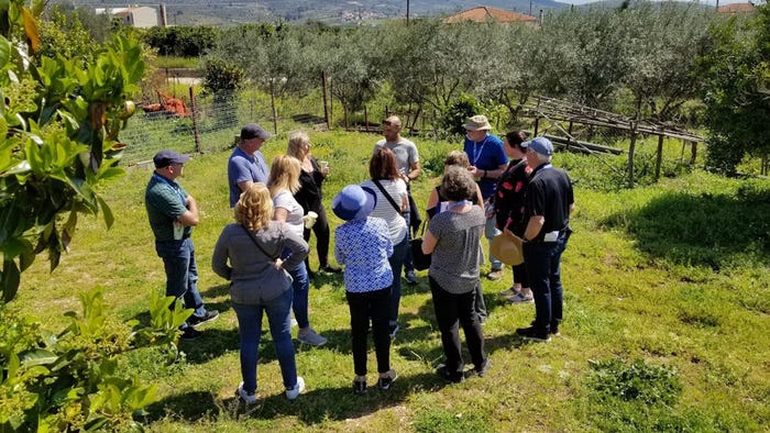 Wisconsin-based travel group on a farm in Greece