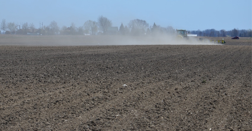 dust blowing in dirt field