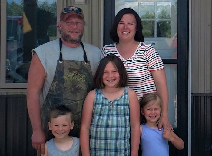 Rob Isaacson with wife Amanda and their three children, Wyatt, Samantha and Alyssa