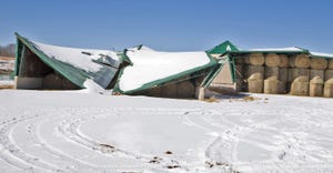 collapsed barn roof due to heavy snow