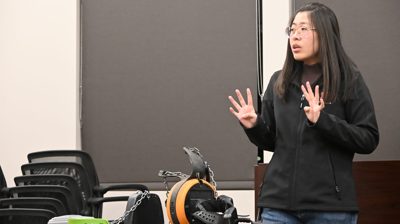 Yijie Xiong, a precision livestock management Extension specialist