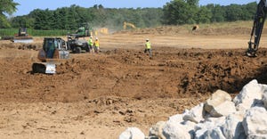 equipment clearing ground for wetland construction
