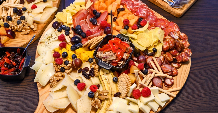 platter of cheese, meat and fruit