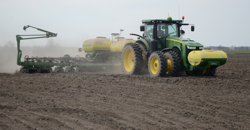 Jimmy Frederick planting corn on river bottom ground in the spring of 2018 Jimmy Frederick planting corn on river bottom ground in the spring of 2018