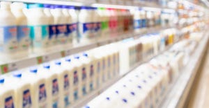 grocer's dairy case blurred