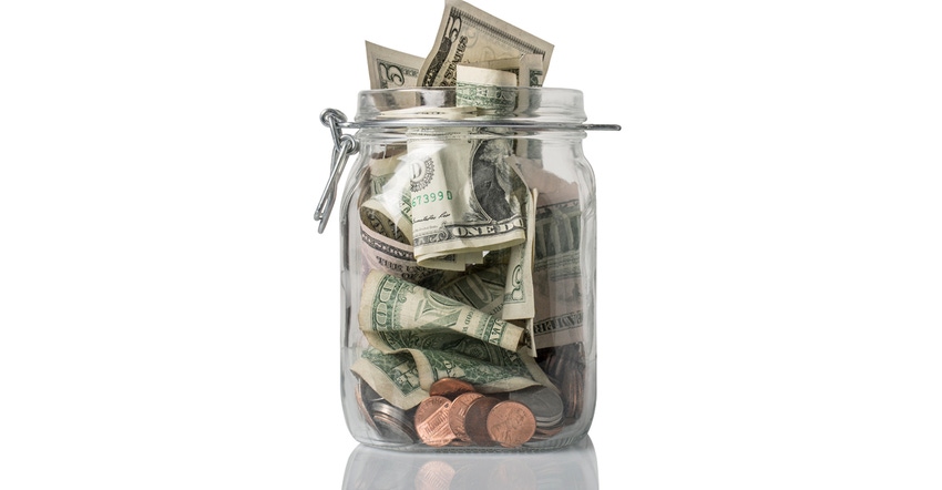 Jar overflowing with money