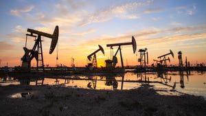 Oil field at sunset
