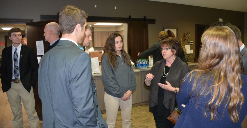 Donna Moenning enjoys speaking with students at Little International reception