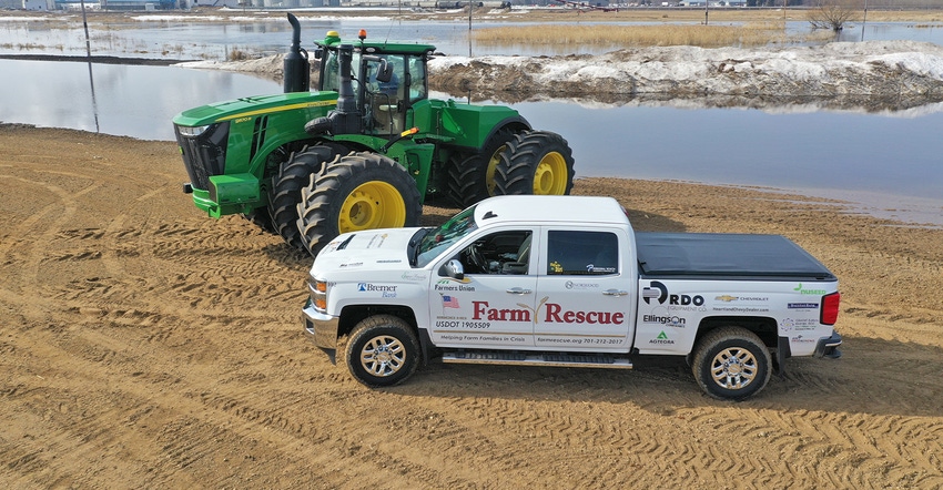 John Deere tractor and Farm Rescue pickup