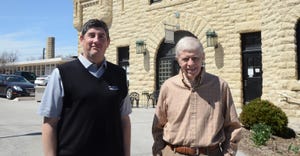 John Dechant (left) and Bob Mundy in front of the Legacy Preservation office at the Carriage House of Joslyn Castle in Omaha.