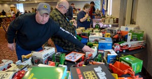 Toy consignors start setting up for the auction