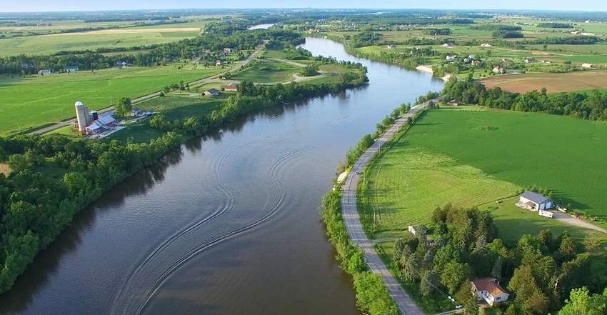 river flows through rural farm area