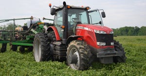 tractor planting into green cover crop
