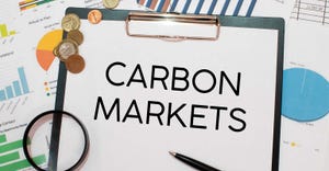 Carbon markets written on clipboard