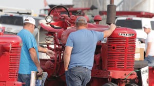  Attendees of HHD looking at antique tractor