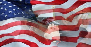 Soldier saluting in U.S. flag