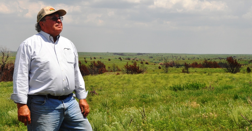 Ted Alexander of Sun City standing in field