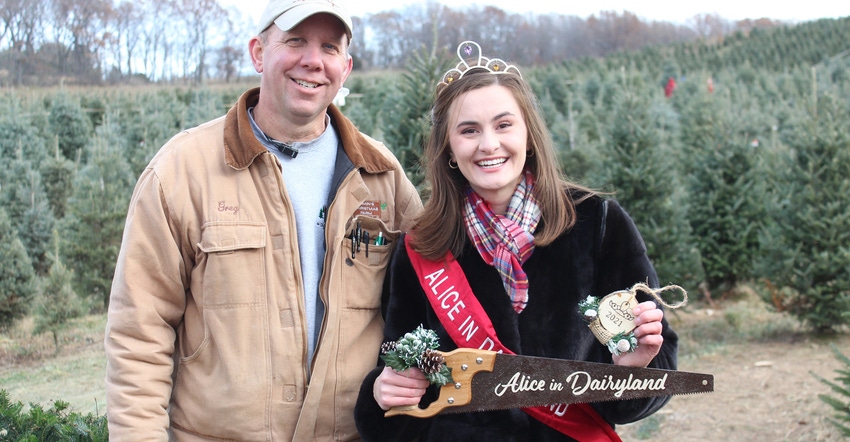 Julia Nunes, the current Alice in Dairyland, with a man at a Christmas tree farm